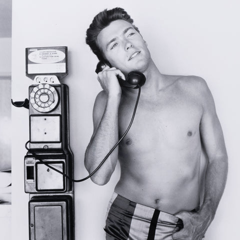 Clint Eastwood Takes A Call By Getty-24x24"