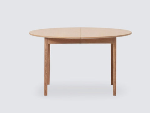 Ease Round Expendable Dining Table
